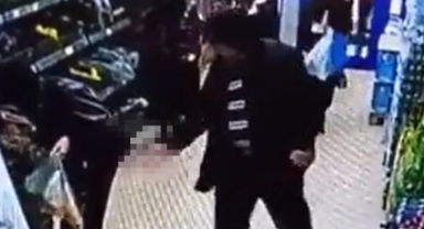 Markette kadını taciz etti