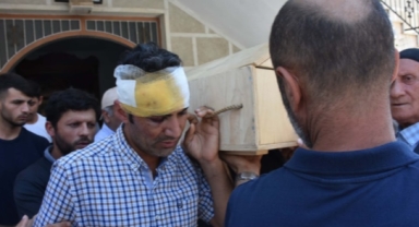 Başında sargıyla kızının tabutunu taşıdı