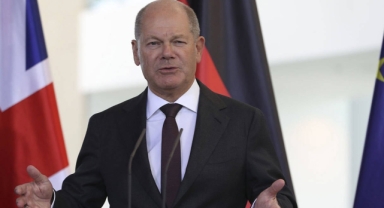 Scholz'dan partilere çağrı