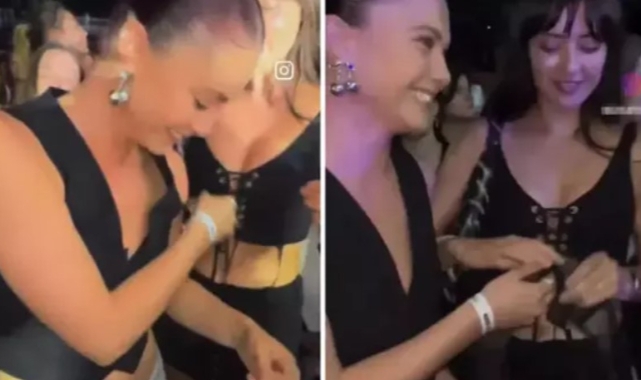 Sütyenini çıkarıp sahnedeki sanatçıya fırlattı