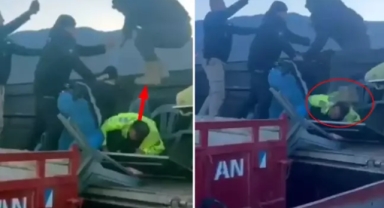 Polisin kafasını ezmeye çalıştı