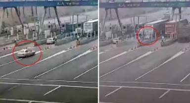 Otomobil gişelerde bekleyen tırın altına böyle girdi