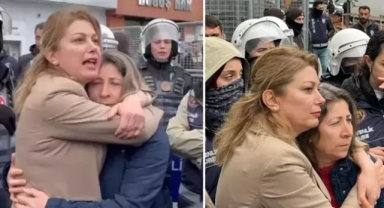 Gözaltına alınmak istenen muhtara sıkı sıkı sarıldı