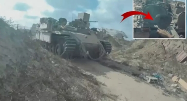 Tanka tırmanıp patlayıcıyı aracın içine bıraktı